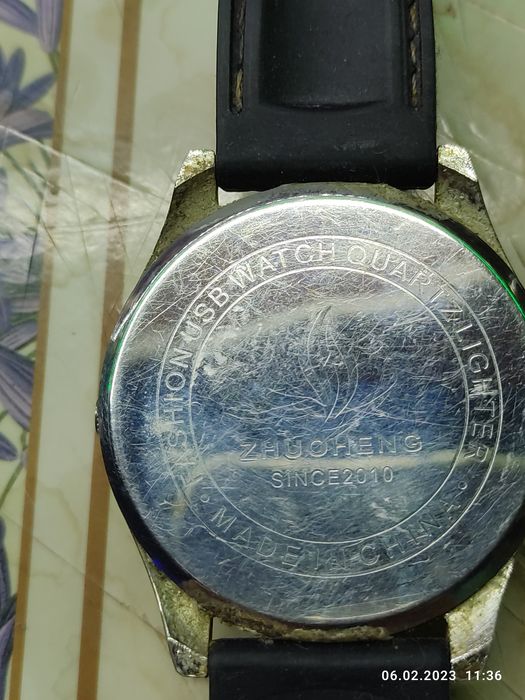 Часы с зажигалкой,зарядкой.