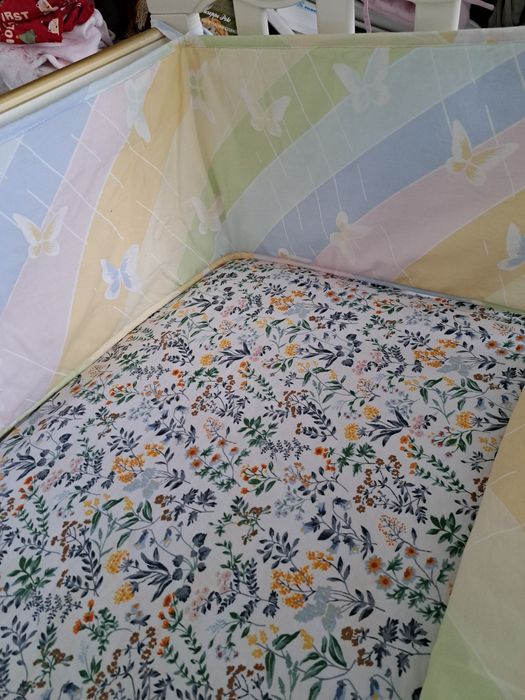 Бортики в ліжечко для хлопчика чи дівчинки