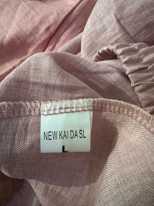 Calças em tecido tipo Linho