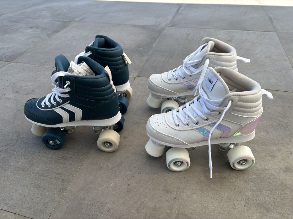 2pares de Patins de 4 rodas novos