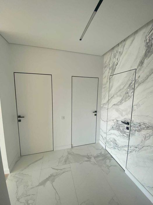 Міжкімнатні двері прихованого монтажу від виробника