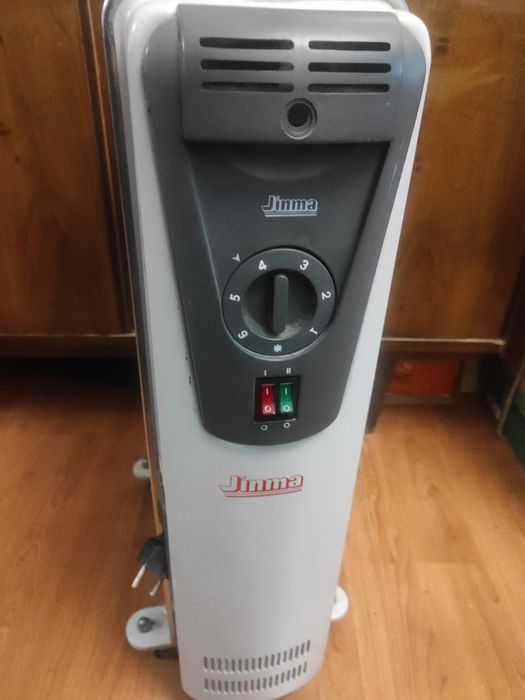 Масляный радиатор обогреватель 1.5Квт