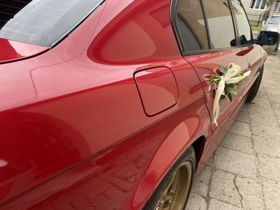 BMW Seria 7 740i M-SPORT Imola Red UNIKAT
