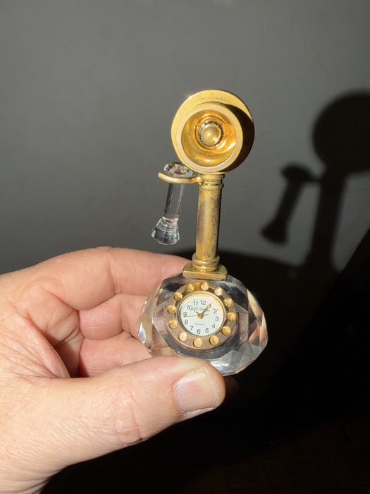 Colecao de relogios em cristal e ouro