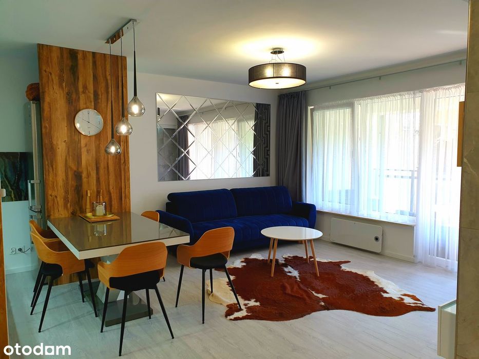 Przestronne mieszkanie z balkonem i garażem w apartamentowcu
