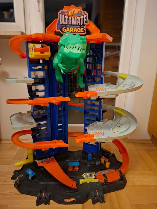 Hot Wheels mega garaż T-Rexa + samochodziki