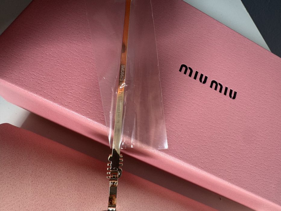 Okulary przeciwsłoneczne Miu Miu cały komplet