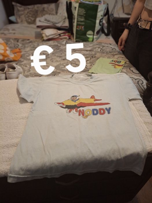 Roupa de criança dos 9 aos 10