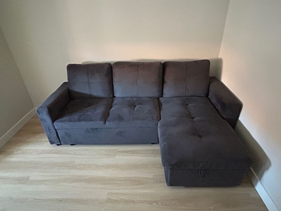 Sofá cama com chaise longue e arrumação – Cinzento escuro | Conforama