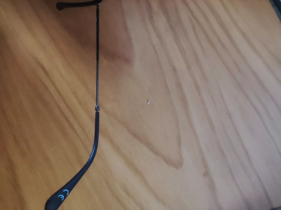 Óculos sol marca reflexo