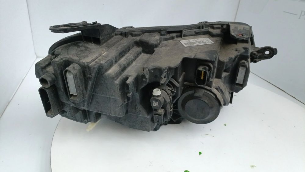 Ótica / farol esquerda DACIA Duster (HM_)
