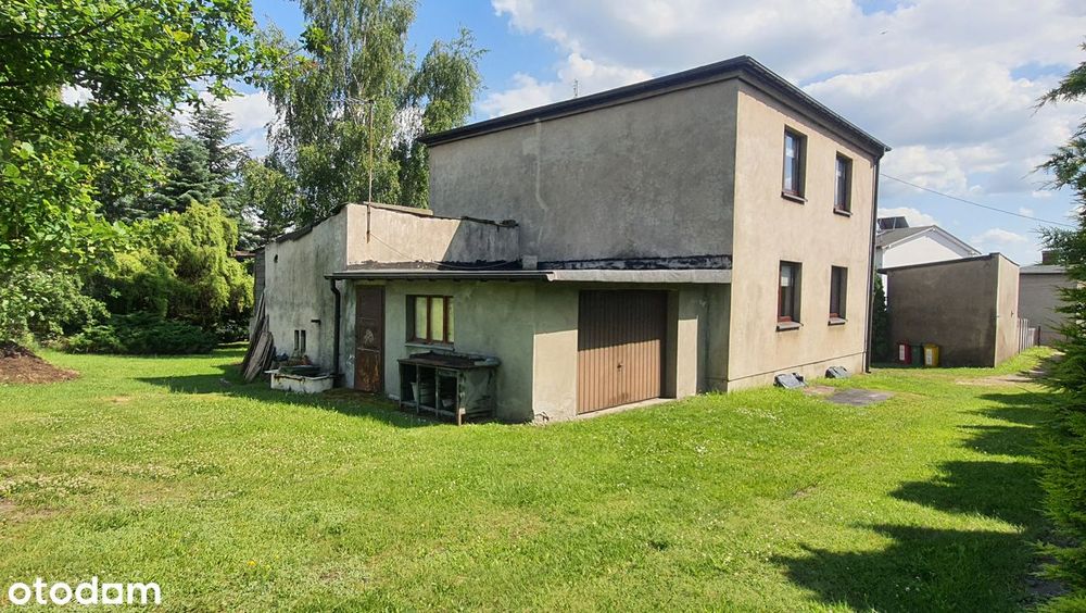 Dom z piwnicą , garażem i dużym ogrodem