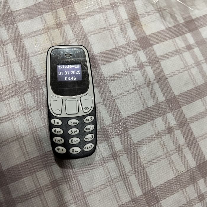 Telemóvel miniatura