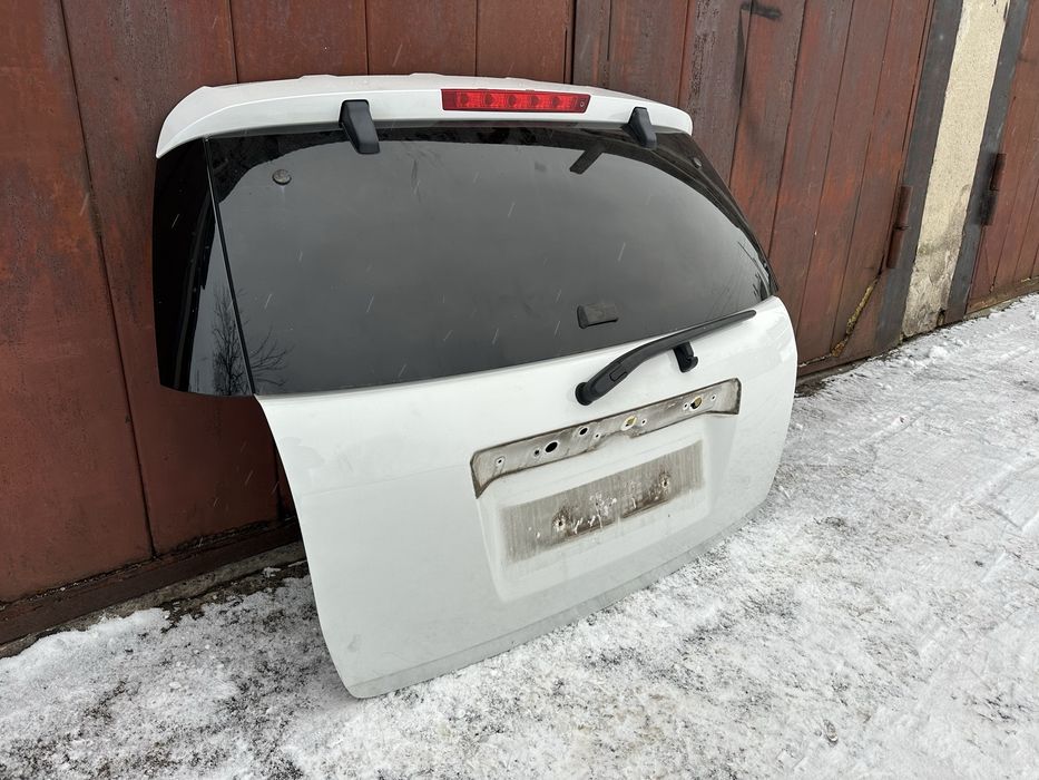 Дверка двері кляпа Chevrolet Captiva