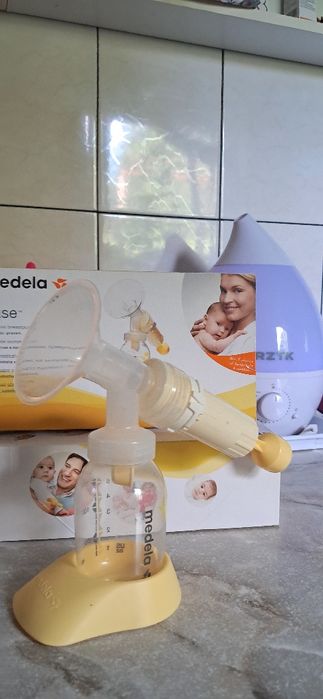 Механічний молоковідсмоктувач  medela