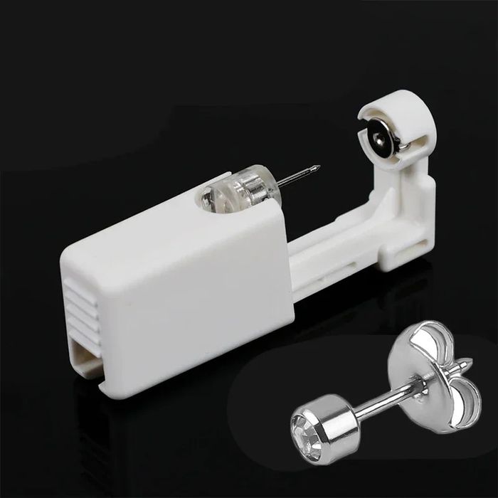 Piercings e bijuteria e maquina de furos