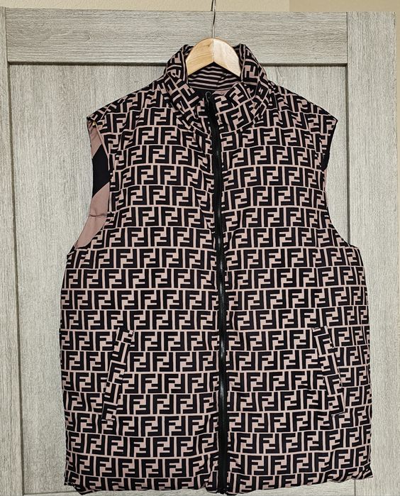 Жіноча двостороння жилетка