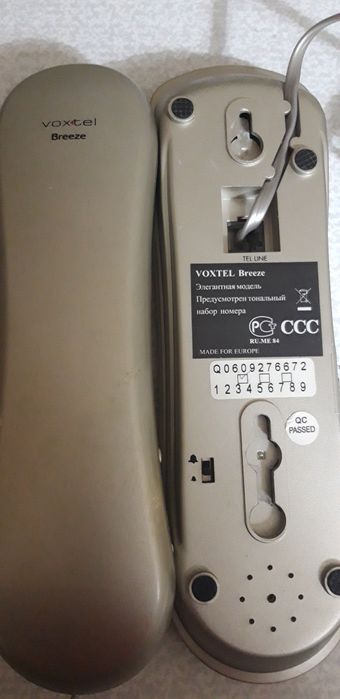 Телефон кнопочный  проводной б/у,рабочий.