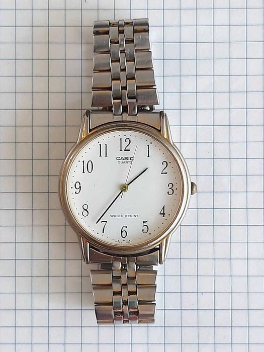 Мужские часы CASIO QUARTZ  MTP-1084 MDVT б/у