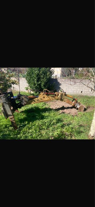 Braço retro para trator