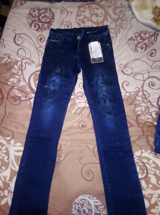 Джинсы на девочку