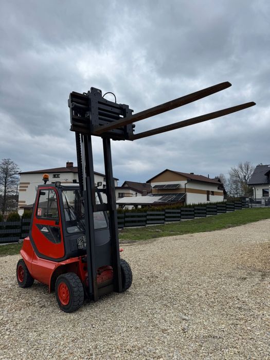 Wózek widłowy Linde H40D (obrotnica, długie rozsuwane widły , kabina)