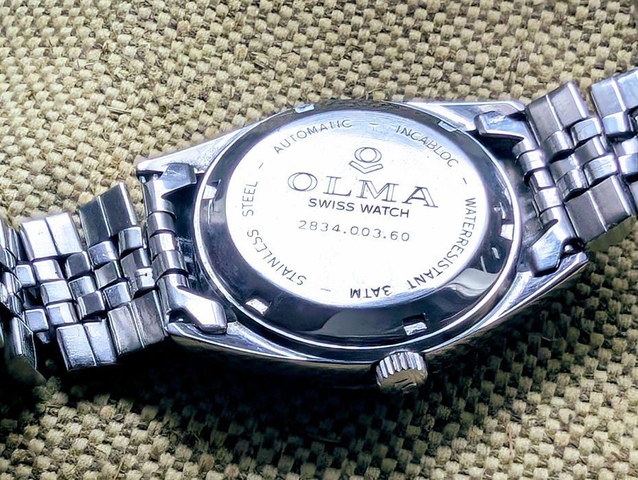 Швейцарские часы  Olma