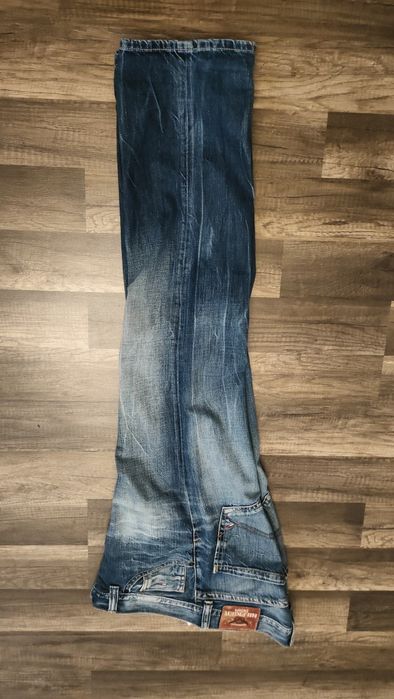 świetne jeansowe spodnie TOMMY HILFIGER 30/32