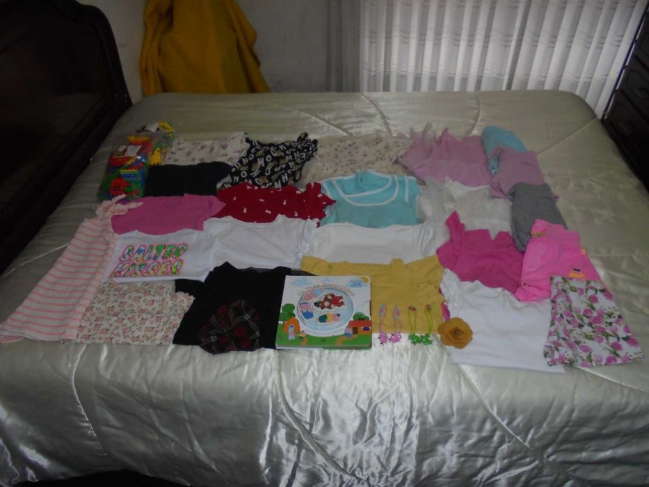 lote de roupa de menina a contorção