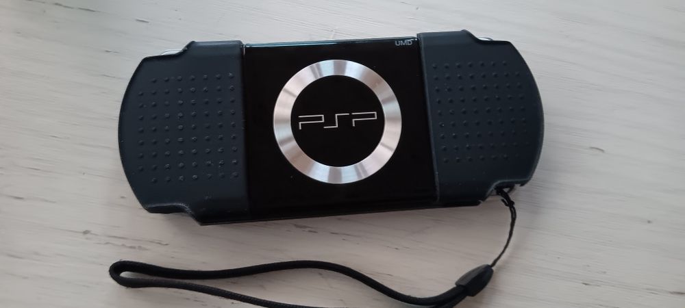 PSP(+200jogos)+protecção de silicone+bolsa