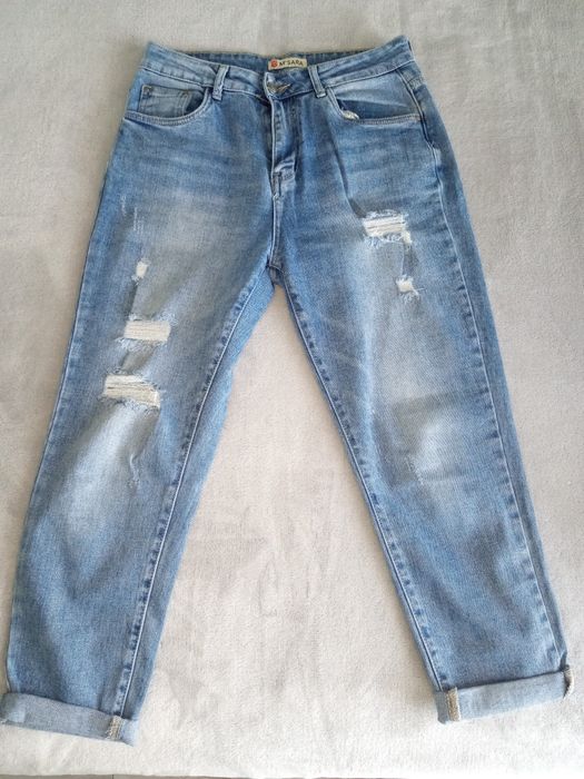 Spodnie dżinsowe z przetarciami