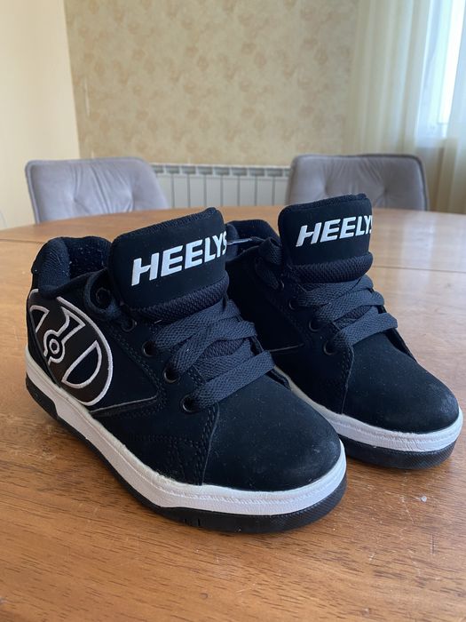 Роликовые кроссовки Heelys
