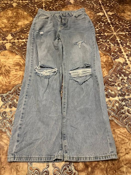 balenciaga distressed type jeans
