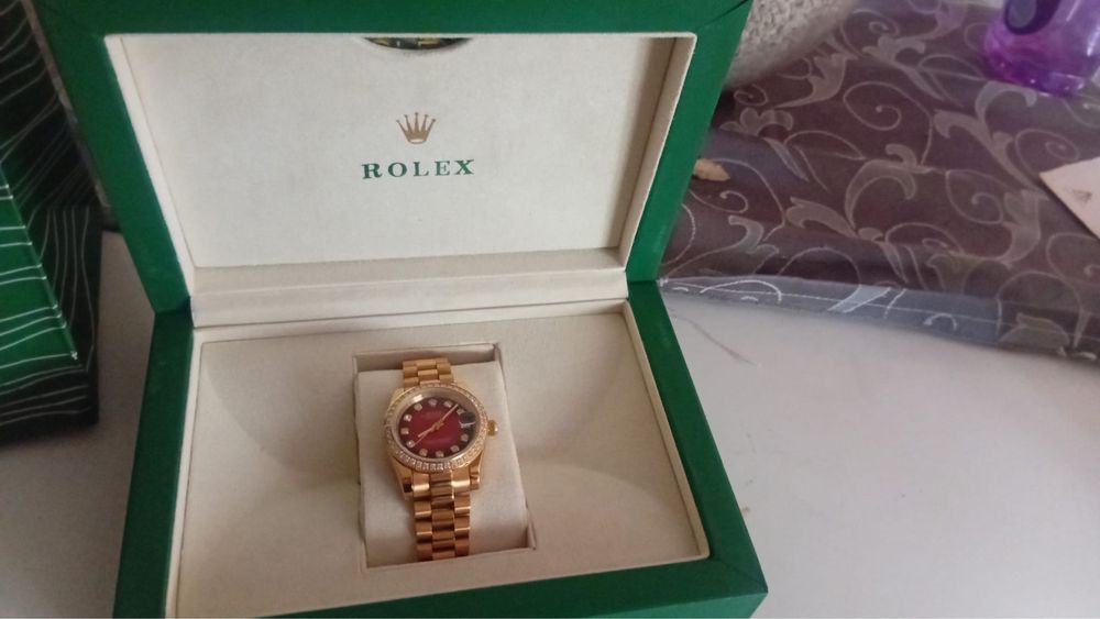Rolex gold and red