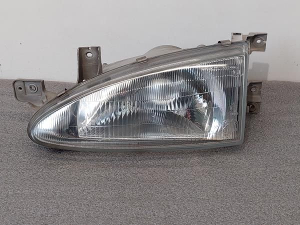 Ótica / farol esquerda HYUNDAI Accent I Sedan (X3)