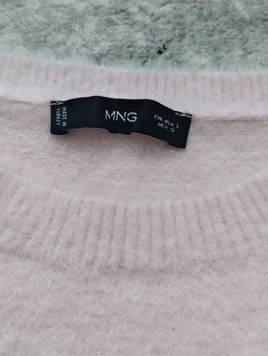 Пухнаста рожева кофтинка