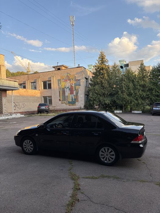 Mitsubishi lancer 9 1.6 газ автомат