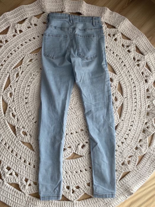 Spodnie jeansowe Sinsay 34