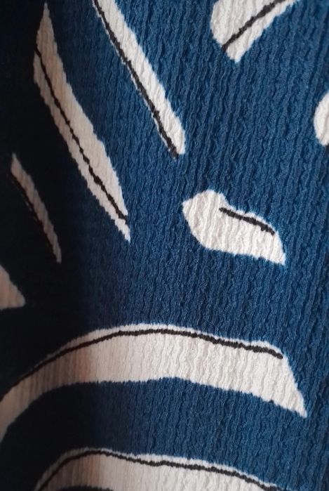 Materiałowe spodnie damskie H&M rozm.50