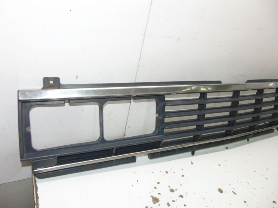 Datsun Pick Up grelha frontal / volante