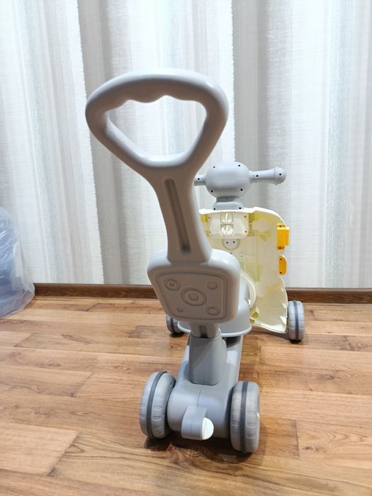 Музичні ходунки толокар каталка гойдалка, столик розвиваючий