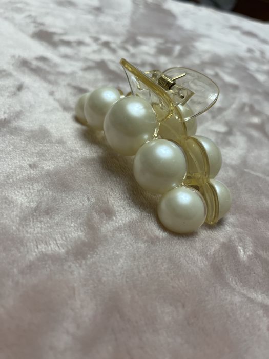 Mola cabelo com pérolas