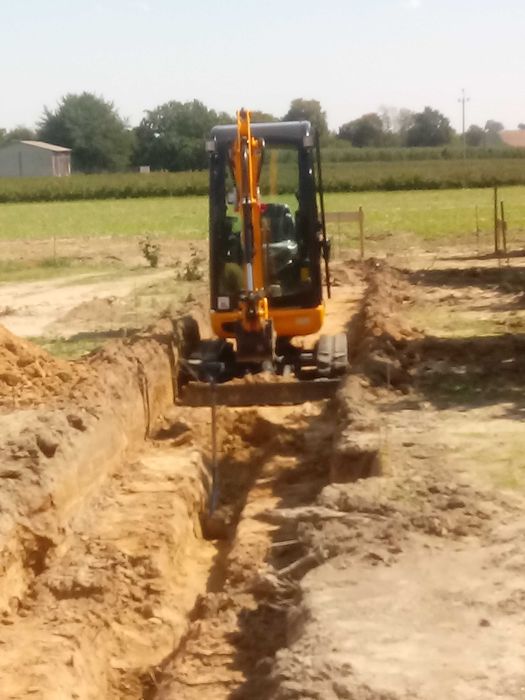 Wykopy, prace ziemne, koparko-ładowarka, minikoparka