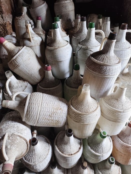 Garrafões de Vidro com plástico