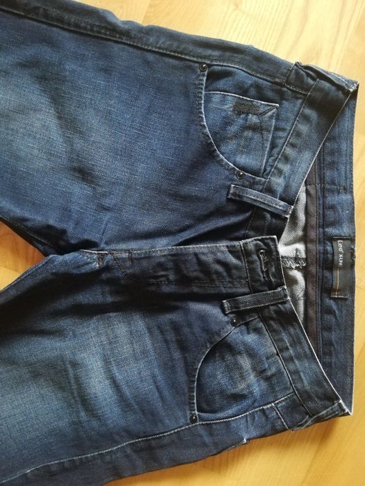 Męskie spodnie jeansowe Lee, W28