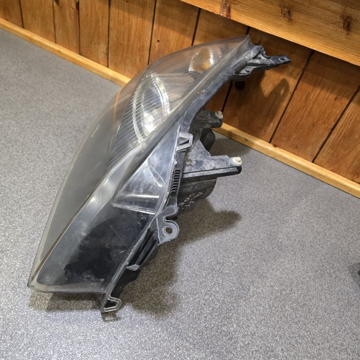 Фари передні Opel Astra H, Орель Астра Н 1EG27037001 1EG27037002