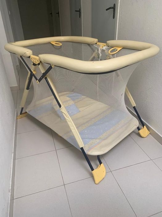 A park for your child to rest and a bed without a mattress