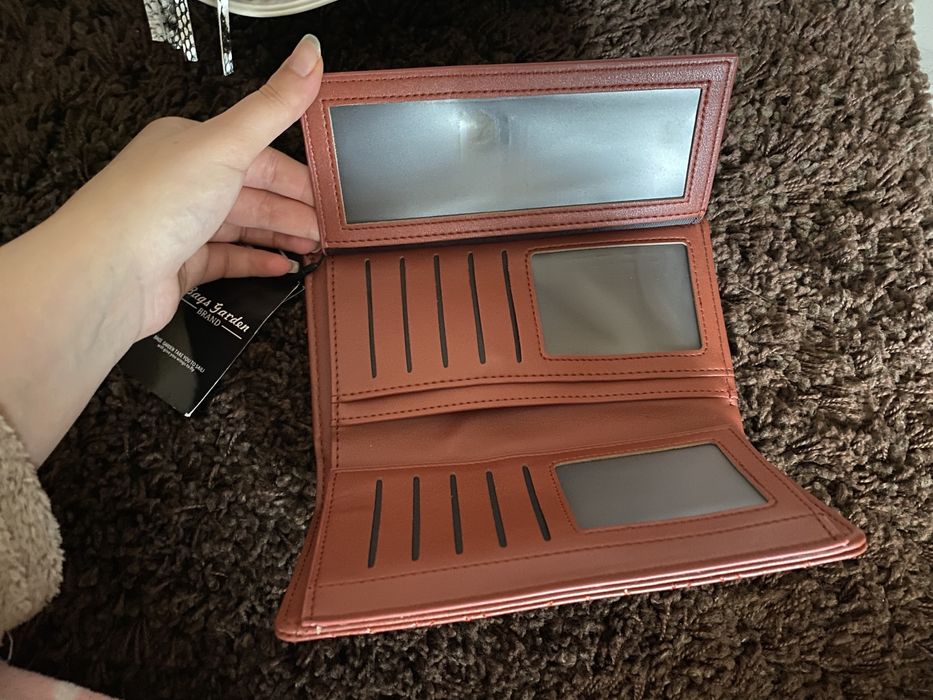 Mala e carteira novas