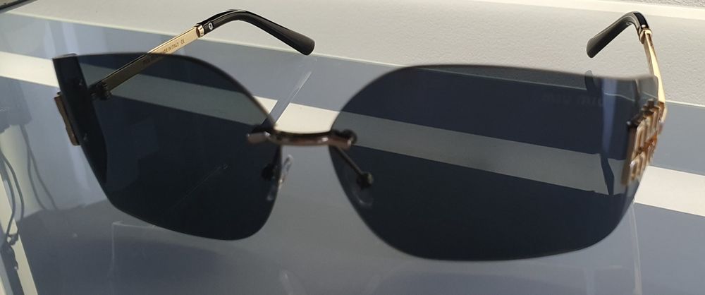 Okulary damskie Miu Miu