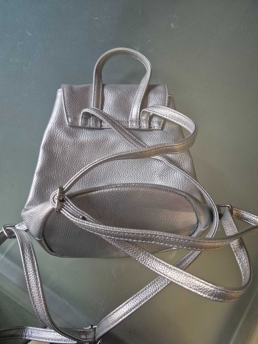 Mochila infantil prateada com unicórnio e estrela